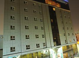 Corp Executive Hotel Doha Suites，位于多哈的酒店