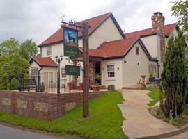 The Greyhound Inn，位于埃登布里奇彭斯赫斯特广场和花园附近的酒店