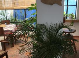 卡萨摩尔卡耶公寓，位于墨西哥城阿尔弗雷多瓜蒂罗霍国家水彩博物馆附近的酒店