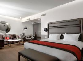 假日套房酒店，位于雅典Ilisia的酒店