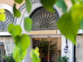 雅典阿瑞姆极可意套房酒店，位于雅典尼奥斯·科斯莫斯的酒店
