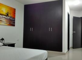 Hotel El Emigrante，位于哥伦比亚港的酒店