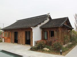 苏州太湖湿地雅居酒店，位于Siqiaotou的酒店