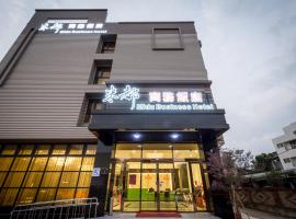 米都商务饭店，位于Xiluo的酒店