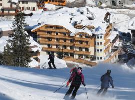 Boutique Hotel Diana，位于摩德纳迪-坎皮格里奥Madonna di Campiglio Ski Resort附近的酒店