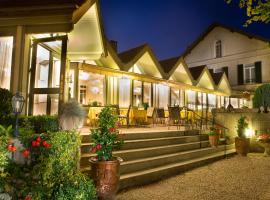 Hôtel & Restaurant Le Relais d'Aumale，位于尚蒂伊的酒店