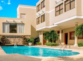 Hotel Majestic，位于巴兰基亚的带停车场的酒店