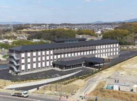 Hotel Route Inn Osaka Izumi -Kishiwada Izumi Inter-，位于Izumi关西自行车体育中心附近的酒店