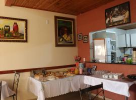 Hotel Olhos D'Agua，位于Ôlho dʼÁgua的酒店