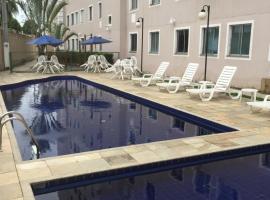 Spazio Solarium - Apartamento，位于劳鲁-迪弗雷塔斯的带泳池的酒店