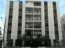 Apartamento Guarujá，位于瓜鲁雅阿斯图里亚斯海滩附近的酒店
