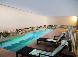 Dubai Suites，位于蒙蒂斯克拉鲁斯巴伊亚会议中心附近的酒店