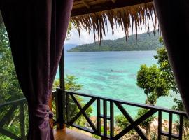 湾景日落旅馆，位于丽贝岛的酒店