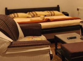 Hotel O2 Residency，位于Vattalkundu的酒店