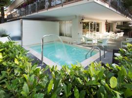 阿特拉斯酒店，位于里乔内的带热水浴缸的酒店