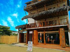 Cocoa Inn Hostal，位于卡诺阿的海滩短租房