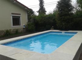 西扎度假屋，位于Luis Guillón的酒店