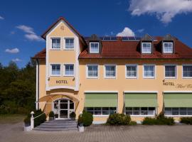 阿特维特酒店，位于哈尔伯格摩斯慕尼黑埃谦里高尔夫中心附近的酒店