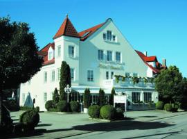 丹尼尔斯酒店，位于哈尔伯格摩斯慕尼黑埃谦里高尔夫中心附近的酒店