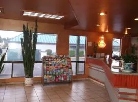 日出酒店 