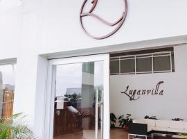 Luganvilla Business Hotel and Restaurant，位于卢甘维尔的酒店