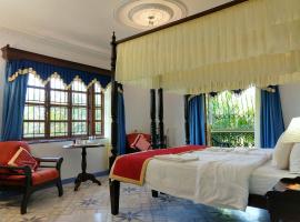 Palm Grove Cottages - Leisure Resort，位于比纳里姆的酒店