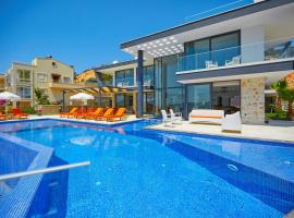 Villa Unlimited 5 Bedroom Luxury Villa with Infinity Pool，位于卡尔坎的酒店