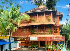 Kumarakom Wood Castle Serviced Appartments，位于库玛拉孔Kumarakom Bird Sanctuary附近的酒店