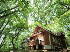 Izumigo AMBIENT Yatsugatake Cottage，位于北斗市的酒店