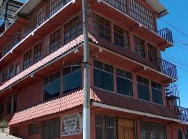 Casa Xelaju Apartments，位于克萨尔特南戈Quetzaltenango Central Park附近的酒店