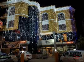 The North Park，位于Badagara的酒店