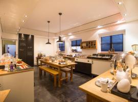 布克勒酒店，位于费尔巴赫的酒店