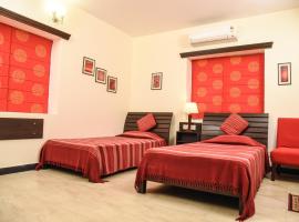 Red Arrow Residency，位于加尔各答南丹剧院附近的酒店
