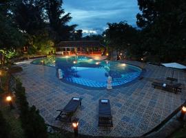 绿色热带村酒店，位于丹戎潘丹的海滩短租房