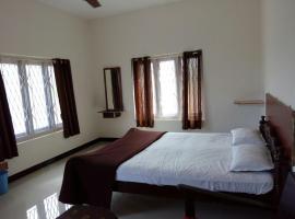 Niligiri holiday resorts，位于Gūdalūr的酒店
