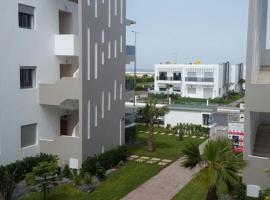 Blanca Beach vue latérale sur mer，位于西迪拉哈尔的酒店