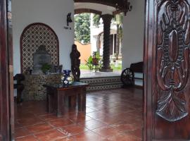 Hotel Villa Palmeras，位于特科卢特拉的酒店