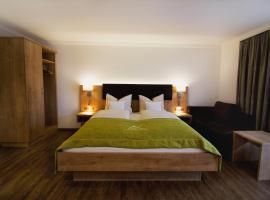 Hotel Alp Inn - Chiemgaukarte inclusive，位于鲁波尔丁的酒店
