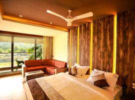 Athirapally Riverine Suites，位于阿西拉帕利的酒店