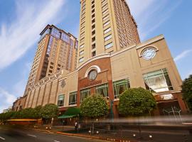 The Bellevue Manila，位于马尼拉菲林韦斯特滕特会展中心附近的酒店