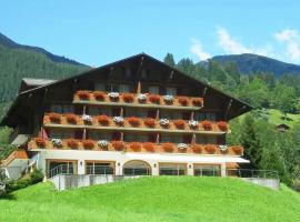 Hotel Gletscherblick Grindelwald，位于格林德尔瓦尔德普芬斯蒂格吊厢索道站附近的酒店