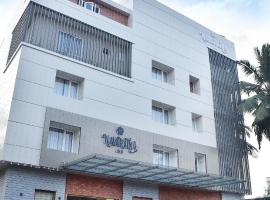 NAVARATNA INN - A LUXURY HOTEL，位于Tellicherry的酒店