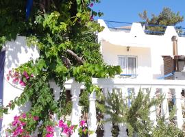 天堂公寓式酒店，位于阿彻奇洛斯的酒店