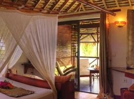 FARE PEA ITI - Romantic Lodge - Taha'a，位于Patio的酒店