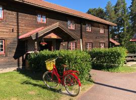 Rättviksgårdens Vandrarhem，位于赖特维克Rättviksbacken Sports Centre Ski Lift 1附近的酒店