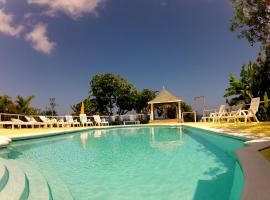 牙买加色调酒店，位于Pleasant Hill的酒店