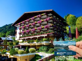 ALPIN- Das Sporthotel - SKI IN SKI OUT cityXpress, SUMMERCARD INCLUDED，位于滨湖采尔的浪漫度假酒店