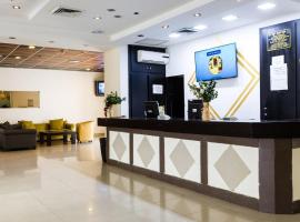 Golden Tower，位于亚实基伦的酒店