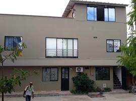 Hermosa casa en Puerto Triunfo，位于特里温福港的酒店