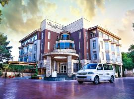 格兰德艾姆酒店，位于纳沃伊Stantsiya Malik附近的酒店